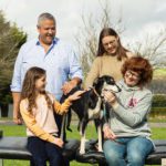 'Pause for a Cause' Photo of Dr. Ben Martin Dr. Jess Crosbie and Aisling Martin of Optimal Chiropractic with Caithriona from D.A.W.G and her rescued pet Katie the Lurcher.